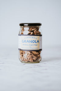 GoodBugs Blueberry Granola jar with activated oats, dried blueberries, ginger, and maple syrup.